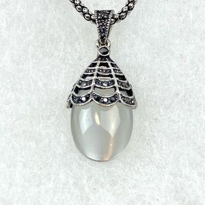 Bundle 3 for $45. Vintage white Cateye drop pendant